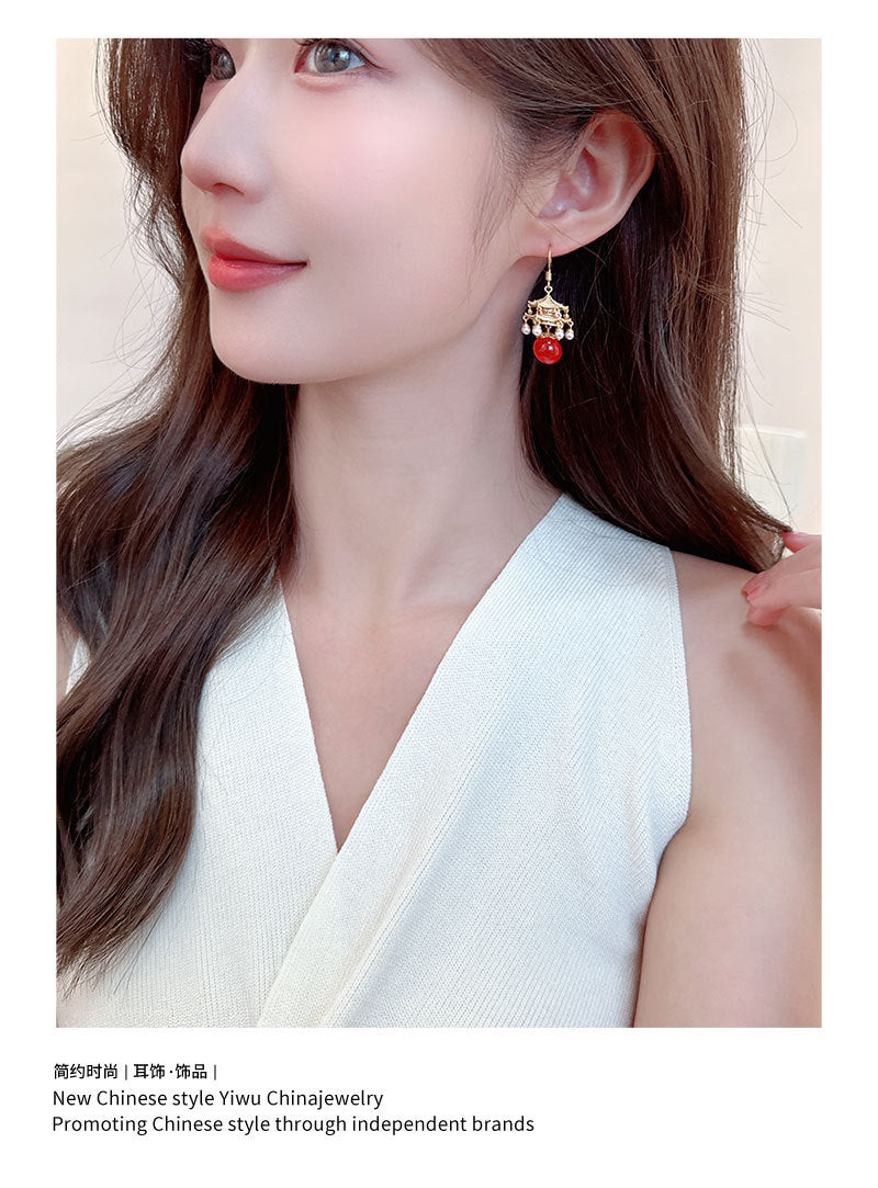 New High-End Rhttps://cdn.shopify.com/s/files/1/0714/1392/3989/files/431ddb6a-3c22-4386-96ef-687b07d471d4.jpg?v=1751779785ed Agate Pearl Tassel Ancient Style Earrings New Chinese Style High-End Pavilion Palace Lantern Court Style Earrings