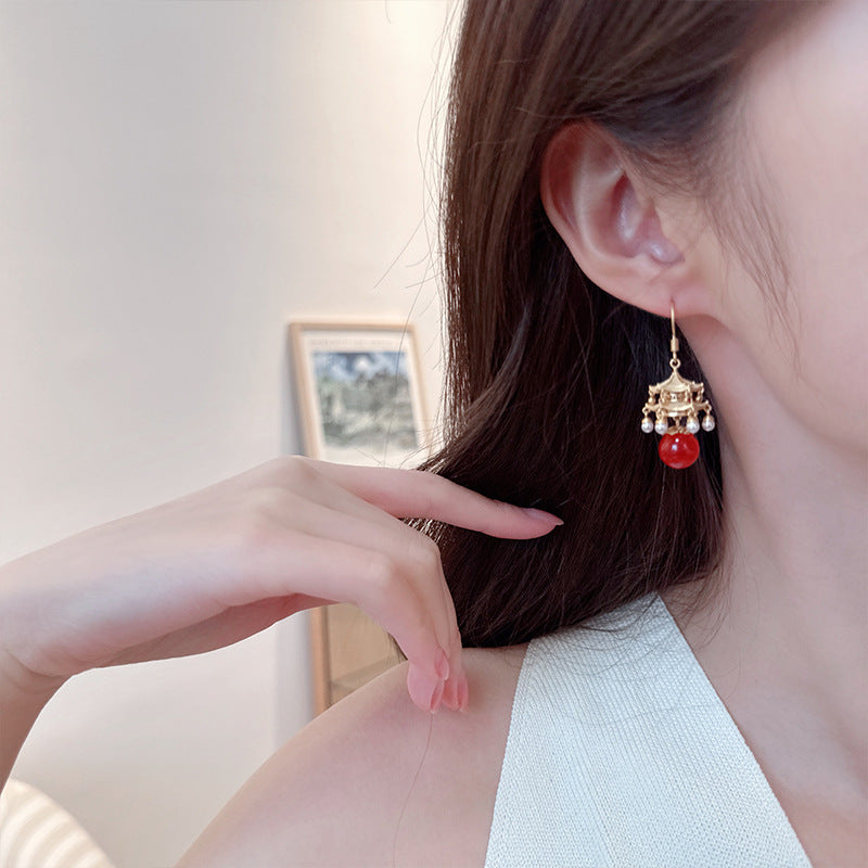 New High-End Rhttps://cdn.shopify.com/s/files/1/0714/1392/3989/files/431ddb6a-3c22-4386-96ef-687b07d471d4.jpg?v=1751779785ed Agate Pearl Tassel Ancient Style Earrings New Chinese Style High-End Pavilion Palace Lantern Court Style Earrings