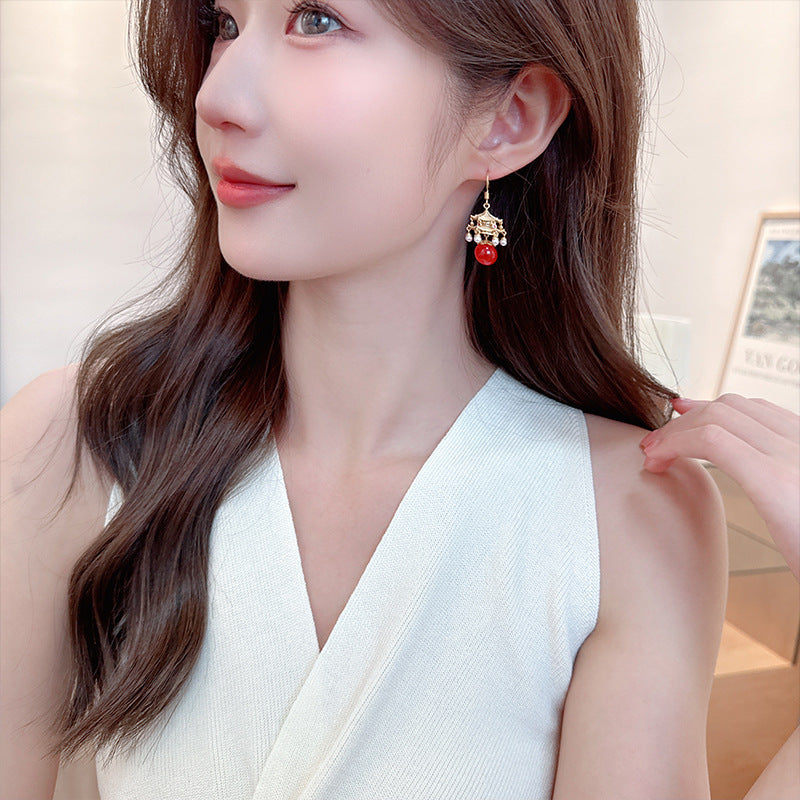 New High-End Rhttps://cdn.shopify.com/s/files/1/0714/1392/3989/files/431ddb6a-3c22-4386-96ef-687b07d471d4.jpg?v=1751779785ed Agate Pearl Tassel Ancient Style Earrings New Chinese Style High-End Pavilion Palace Lantern Court Style Earrings