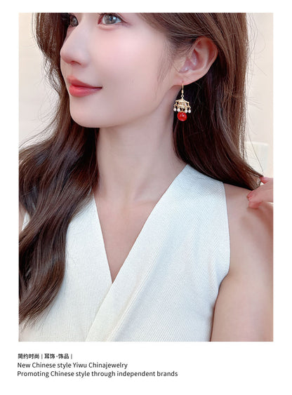 New High-End Rhttps://cdn.shopify.com/s/files/1/0714/1392/3989/files/431ddb6a-3c22-4386-96ef-687b07d471d4.jpg?v=1751779785ed Agate Pearl Tassel Ancient Style Earrings New Chinese Style High-End Pavilion Palace Lantern Court Style Earrings